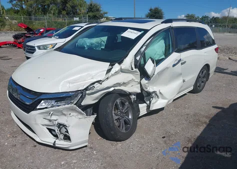 2018 Honda Odyssey Touring from USA, damaged, VIN 5FNRL6H84JB027099